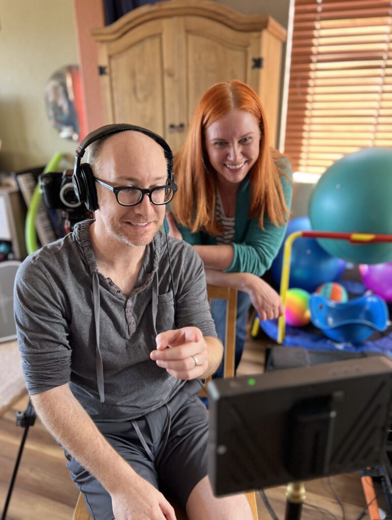 Actor Kate Bergeron and director Vinnie Duyck laugh over the monitor